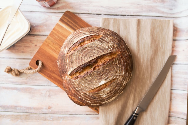 Baked bread on a wooden board