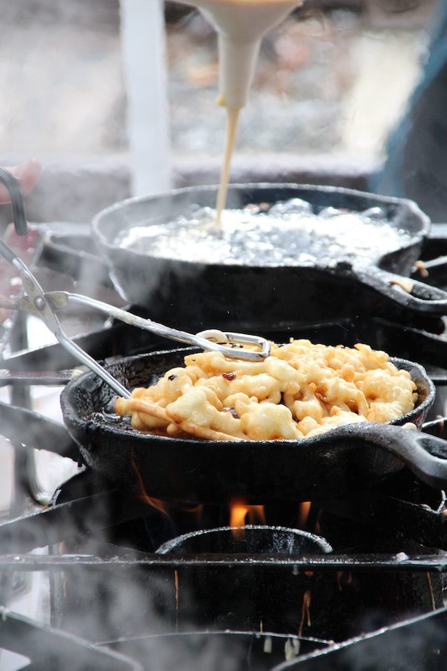 Food cooking in cast iron skillets