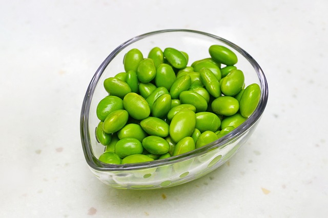 Edamame beans in a clear glass bowl