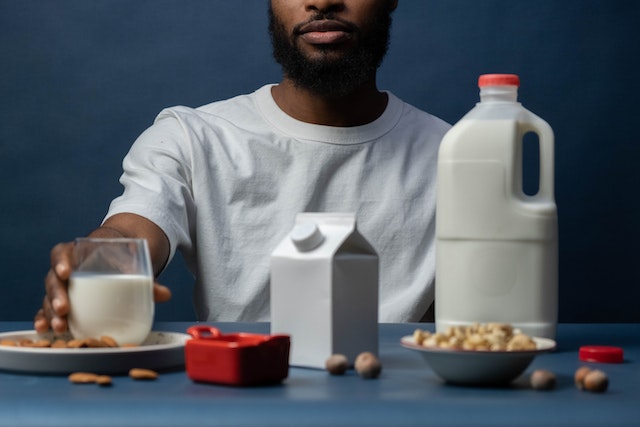 Person drinking milk made from nuts